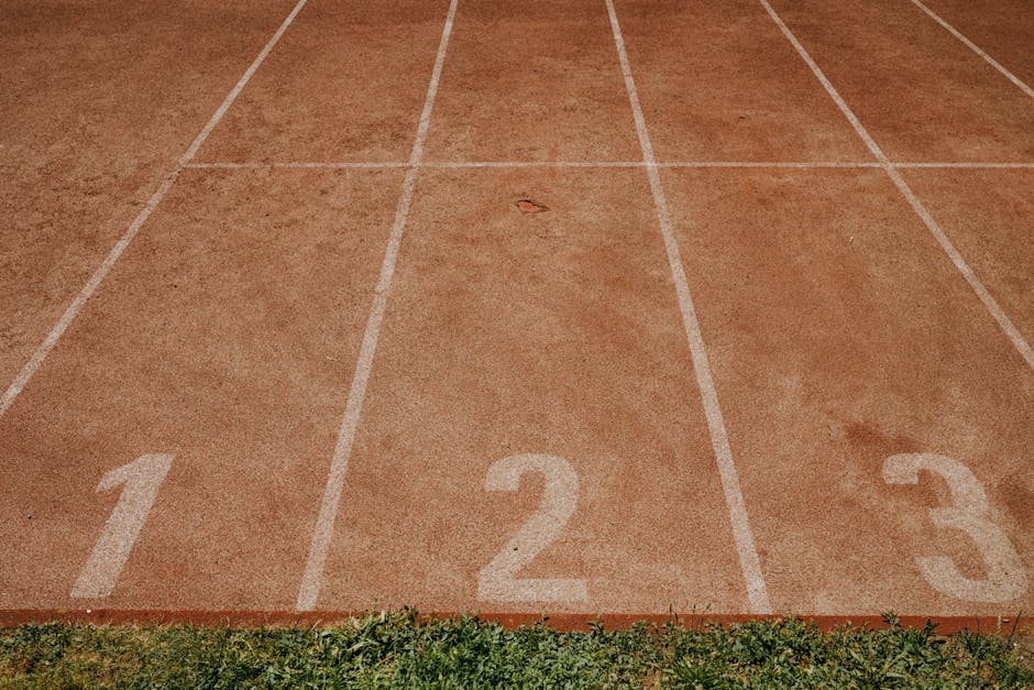Professional running track showing lanes one two and three representing health progress