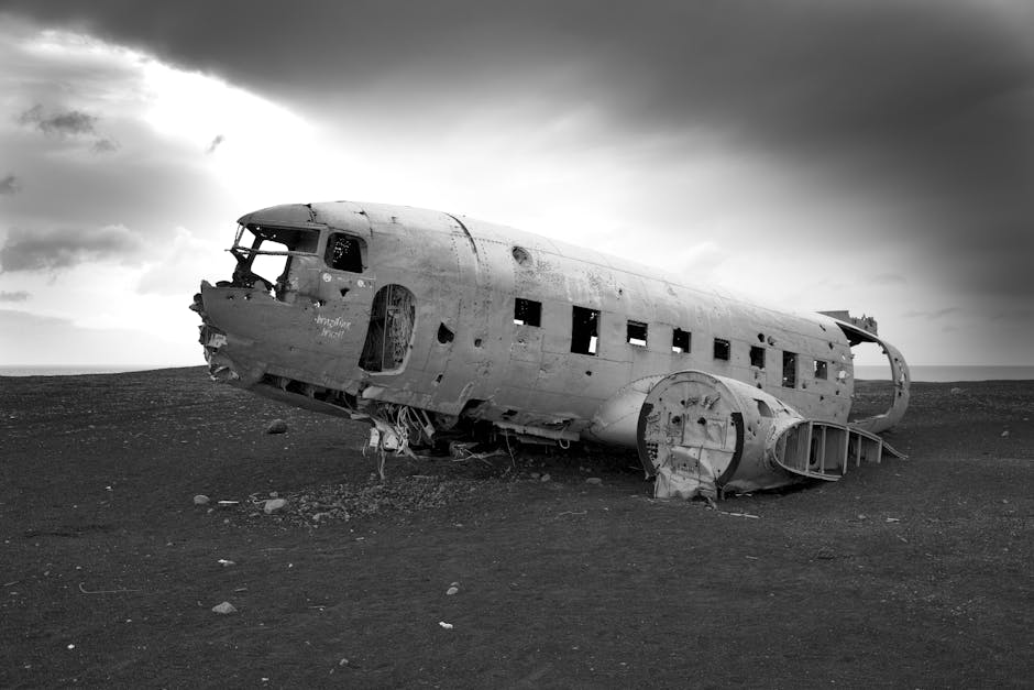 Abandoned plane wreck in black and white representing recovery from trauma